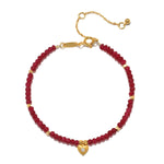 Healing Heart Red Onyx Heart Bracelet featuring tiny red onyx beads and a golden heart with a white topaz, perfect for spiritual jewelry and meditation, symbolizing love and protection.
