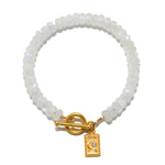 Divine Knowing Moonstone Bracelet featuring shimmering moonstone beads and a beautiful gold clasp, perfect for spiritual jewelry and meditation. This talisman symbolizes zodiac connections, protection, and meaningful intentions for yoga and manifestation.