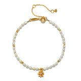 Beautiful Pearl Lotus June Birthstone Bracelet showcasing a lotus flower pendant, symbolizing new beginnings. This spiritual jewelry represents harmony and protection, ideal for meditation and manifestation. Perfect for zodiac enthusiasts and yoga lovers, this meaningful piece embodies love and tranquility.
