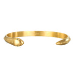 Sacred Guidance Snake Cuff Bracelet displayed elegantly, representing spiritual jewelry and a talisman for meditation and protection. The 18kt gold plated snake design signifies renewal, immortality, and is perfect for yoga practitioners seeking meaning and manifestation in their lives.