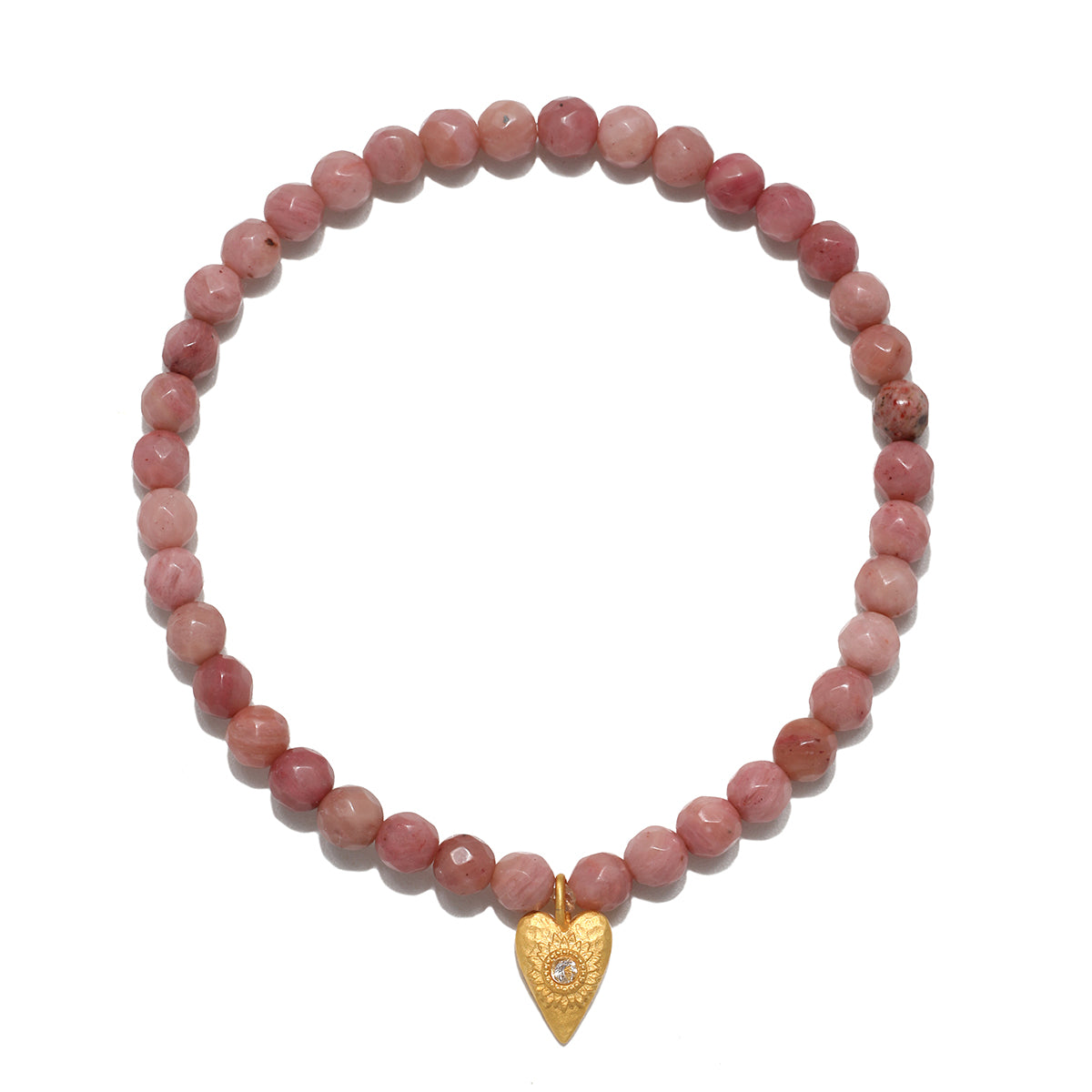 Comforted by Love Rhodonite Heart Bracelet featuring a heart pendant set amidst natural rhodonite beads, symbolizing love and compassion. This spiritual jewelry serves as a meaningful talisman for meditation and manifestation, perfect for yoga practitioners seeking protection and inner growth.