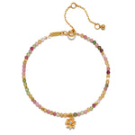 Bloom On Your Path Pink Tourmaline Lotus Bracelet showcasing a delicate lotus pendant with pink tourmaline and topaz beads, symbolizing new beginnings and transformation. This piece of spiritual jewelry is perfect for meditation and is a meaningful talisman for those practicing yoga and manifestation while embracing the energy of the sun and moon.