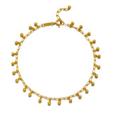 A beautiful Joyful Journey Anklet featuring delicate golden beads that create a soft, bell-like sound with every movement. This spiritual jewelry piece is perfect for meditation and serves as a meaningful talisman for manifestation. Ideal for yoga practices and embodying the energy of the sun and moon, this anklet adds a touch of elegance and protection to your spiritual journey, embodying the essence of zodiac energies.
