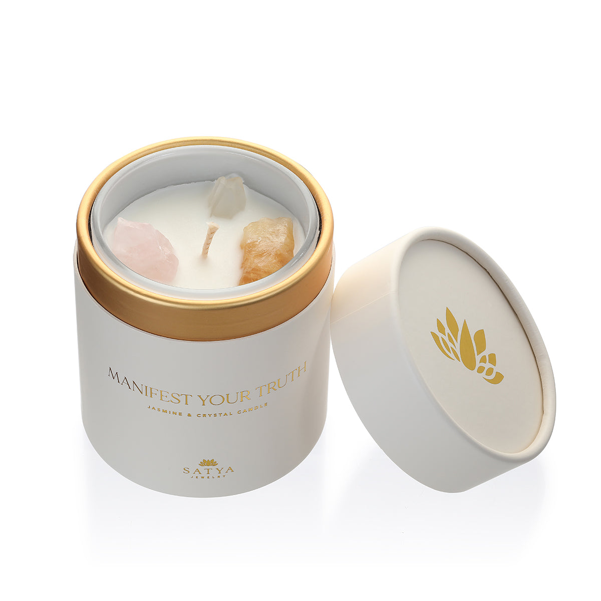 Open view of the Manifest Your Truth Intention Candle by Satya Jewelry, revealing embedded crystals for manifestation and grounding. This candle serves as a perfect spiritual accessory for yoga, embodying the energy of protection and connection to the sun and moon.
