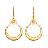 Stellar Sisterhood Moonstone Hoops featuring hammered 18kt gold plate and moonstone accents, embodying spiritual jewelry for those seeking protection and guidance in their meditation and yoga practices. These meaningful earrings symbolize the connection between sun and moon, enhancing manifestation and zodiac energy.