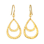 Seek the Light Earrings feature a hammered 18kt gold plated design in an elongated double hoop style, embodying spiritual jewelry ideals such as meditation, protection, and meaningful manifestation, perfect for those who resonate with the sun and moon energy.