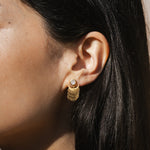 Close-up of Scattering Stardust Moonstone Fringe Stud Drop Earrings worn by a model, showcasing their delicate design as a spiritual talisman ideal for yoga and meaningful self-exploration through the power of moon energy and meditation.