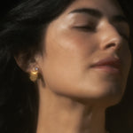 Model wearing Scattering Stardust Moonstone Fringe Stud Drop Earrings, capturing the serene beauty of moonstone as a meaningful piece of spiritual jewelry that enhances meditation and represents the balance of sun and moon energies for personal manifestation and protection.