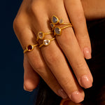 Close-up of the Second Sight White Topaz Ring with other colorful rings, ideal for enhancing spiritual yoga practices and meaningful jewelry for embracing clarity and intention.