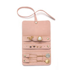 Interior view of the Weekend Journey Travel Jewelry Wrap Holder Pink, showcasing compartments for earrings, rings, and necklaces. This stylish wrap is perfect for keeping your spiritual jewelry organized and ensures your meaningful accessories are protected on your journey.