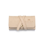 Weekend Journey Travel Jewelry Wrap Holder Tan featuring a soft tan microfiber exterior, ideal for keeping your spiritual jewelry safe. This jewelry organizer is perfect for storing meaningful talismans and is a must-have for meditation and yoga enthusiasts. With its stylish design, it offers protection and embodies the essence of the sun and moon.