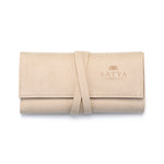 Journey Abroad Travel Wrap by Satya Jewelry, designed to protect your spiritual jewelry, including talismans and malas, with a soft microfiber finish. Ideal for carrying meaningful pieces like zodiac symbols, this packable holder offers protection for your favorites during yoga and meditation practices.