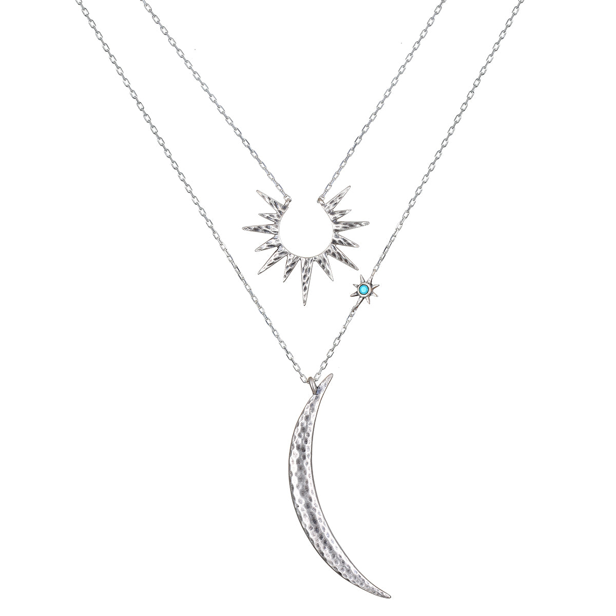 Inspiration Intention Necklace Set Silver featuring a starburst and crescent moon pendants, symbolizing creativity and protection. This spiritual jewelry is perfect for meditation and manifestation, enhancing your yoga practice with meaningful talismans that connect with the sun and moon energies.
