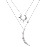 Inspiration Intention Necklace Set Silver featuring a starburst and crescent moon pendants, symbolizing creativity and protection. This spiritual jewelry is perfect for meditation and manifestation, enhancing your yoga practice with meaningful talismans that connect with the sun and moon energies.