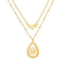 Intention of New Beginnings Necklace Set featuring two layered necklaces, one with a lotus flower pendant and the other with delicate leaf shapes, embodying spiritual jewelry for meditation, manifestation, and personal growth.