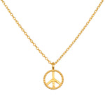 In Pursuit of Peace Necklace featuring a gold peace insignia on a delicate chain, embodying spiritual jewelry and meaning for meditation and manifestation.