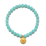 Throat Chakra Amazonite Stretch Bracelet featuring 6mm faceted amazonite stones, perfect for spiritual jewelry, meditation, and manifestation. This meaningful talisman supports communication and calm, resonating with yoga enthusiasts and those seeking protection and harmony in their lives.