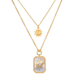Two-strand gold necklace set with small sun charm and rectangular pendant featuring sun motif with crystal center.
