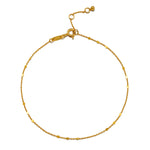 The Step Into Light Shimmering Chain Anklet features an elegant design with a delicate cable chain and flat coin detail, showcasing the beauty of spiritual jewelry for meaningful meditation and protection, perfect for manifesting intentions in yoga.