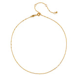 Detailed view of the Twinkling Light Gold Choker Necklace, highlighting its intricate design with shimmering gold plated accents. This choker is a beautiful addition to spiritual jewelry collections, ideal for personal expression and meaningful adornment associated with zodiac signs, charms, and meditation.