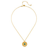 The Nurture Intuition Turquoise Mandala Necklace displayed elegantly, highlighting the 18kt gold plate and turquoise gemstone, perfect for those seeking spiritual connection and meaningful talismans.