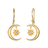Stunning Spirit in Transformation Lotus Moon Earrings featuring a crescent moon and lotus design, perfect for spiritual jewelry enthusiasts. Ideal for meditation, this talisman embodies the essence of the zodiac and offers protection, making it a meaningful charm for manifestation and yoga practices.