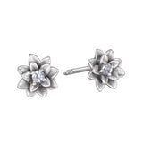 Soul Renewal Silver Lotus Earrings showcasing a beautiful lotus flower design with white topaz accents, symbolizing new beginnings and potential. These spiritual jewelry pieces serve as a perfect talisman for meditation and manifestation, connecting you to your zodiac energies while embodying protection and meaningful charm in your everyday look.