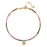 The First Step Tourmaline Lotus Anklet beautifully showcases colorful multi tourmaline beads with a golden lotus flower pendant. This piece embodies spiritual jewelry for meditation and serves as a meaningful talisman for abundance and new beginnings, ideal for those on their manifestation journey.