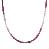 Shades of Passion 14kt Gold Ruby Necklace displayed in an ombré effect with varying ruby shades, perfect for spiritual jewelry and meditation, symbolizing passion and protection for your yoga practice.