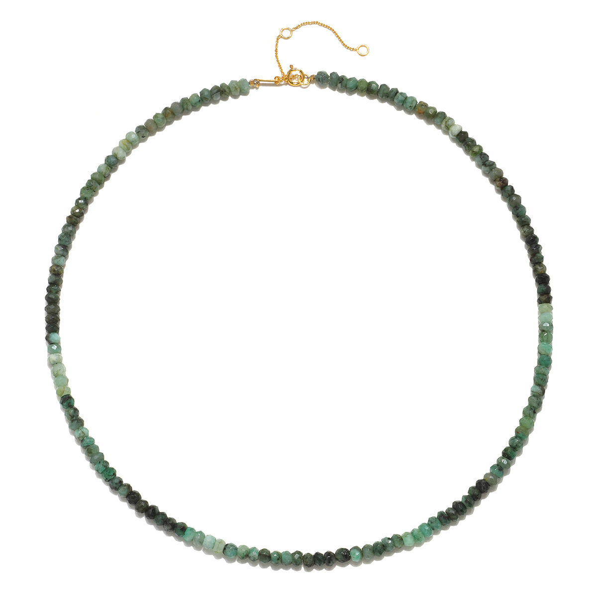 The Shades of Wisdom 14kt Gold Emerald Necklace displayed elegantly, showcasing its ombré effect with 4mm faceted rondelle emeralds. This necklace is not only a beautiful piece of spiritual jewelry but also a sacred talisman that embodies the meanings of abundance and mercy, ideal for meditation and enhancing yoga practices.