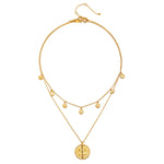 A full view of the Intention of Balance Necklace Set displaying its intricate layers, including a coin pendant and chakra symbols, representing a meaningful talisman for zodiac alignment and meditation.