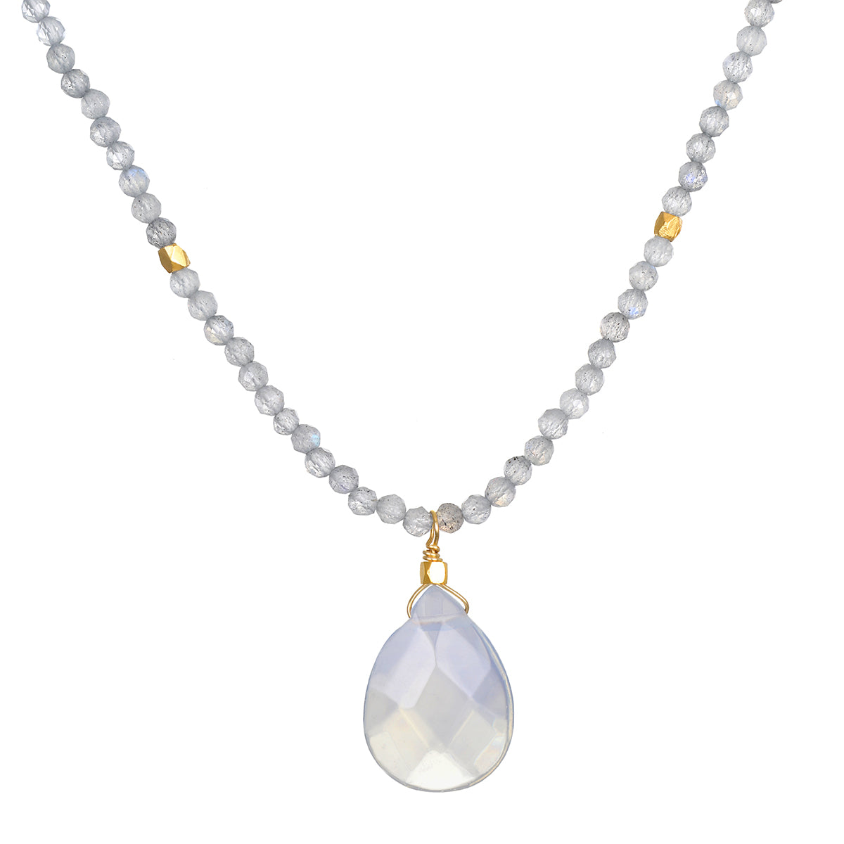 A necklace of small gray faceted beads with two gold accent beads holds a pale, milky teardrop-shaped pendant.