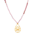 Bloom In Love Rose Quartz Lotus Mala with rose quartz beads and a gold-plated lotus pendant, symbolizing unconditional love and new beginnings. Ideal spiritual jewelry for meditation and manifestation practices, serving as a protective talisman. A meaningful accessory for yoga enthusiasts and those interested in zodiac charms.