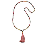 The Peaceful Spirit Tourmaline Gemstone Mala displayed against a clean white background, highlighting its intricate design. This beautiful mala represents a powerful piece of spiritual jewelry for meditation and yoga, serving as a talisman for meaningful manifestations and protection.