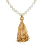Wisdom Lotus Pearl Gemstone Mala with a golden tassel, perfect for spiritual jewelry and meditation, serving as a talisman for protection and manifestation, symbolizing the sun and moon and enhancing your yoga practice.