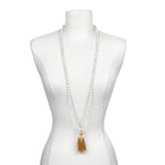 Wisdom Lotus Pearl Gemstone Mala on a mannequin, showcasing its unique design for spiritual jewelry, meditation, and personal meaning, acting as a talisman for protection and manifestation in your yoga journey.