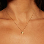 True Heart Gold Pendant Necklace showcased on a model, emphasizing its delicate design and spiritual significance, ideal for meditation, manifestation, and as a meaningful talisman in spiritual jewelry collection.