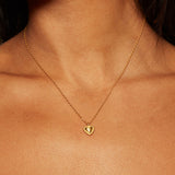 True Heart Gold Pendant Necklace showcased on a model, emphasizing its delicate design and spiritual significance, ideal for meditation, manifestation, and as a meaningful talisman in spiritual jewelry collection.