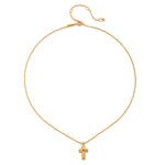 Close-up of the Unwavering Faith Garnet Cross Necklace highlighting its intricate design and 18kt gold plating, representing a meaningful piece for meditation and spiritual protection, making it a perfect addition to yoga and wellness practices.