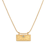December Blue Topaz Sunburst Birthstone Tablet Necklace featuring a radiant sunburst design, perfect for spiritual jewelry enthusiasts. This meaningful piece embodies qualities of communication, wisdom, and love, ideal for meditation and manifestation practices. It serves as a talisman representing the vibrant energies of the sun, making it a beautiful charm for yoga and zodiac enthusiasts.