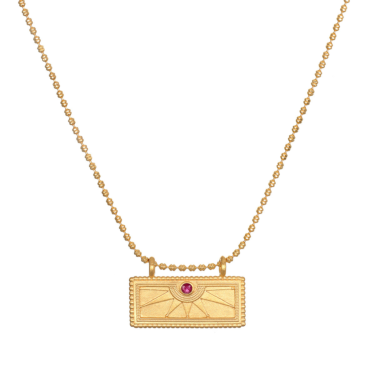 Stylish July Ruby Sunburst Birthstone Tablet Necklace featuring a gleaming 18kt gold plated pendant engraved with a sunburst design and accented with a ruby, embodying spiritual jewelry and protection. This meaningful charm is perfect for yoga and meditation practices, resonating with the energies of the sun and passion.