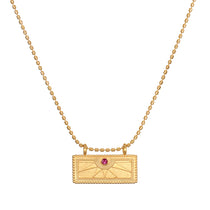 Stylish July Ruby Sunburst Birthstone Tablet Necklace featuring a gleaming 18kt gold plated pendant engraved with a sunburst design and accented with a ruby, embodying spiritual jewelry and protection. This meaningful charm is perfect for yoga and meditation practices, resonating with the energies of the sun and passion.