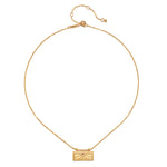 The October Pink Tourmaline Sunburst Birthstone Tablet Necklace displayed elegantly, showcasing its design with a 16-inch chain and 3-inch extension. A beautiful addition to spiritual jewelry collections, this necklace represents abundance, peace, and manifestation.