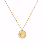 Sacred Realm Spinning Pendant Celestial Necklace featuring an intricately designed crescent moon and a spinning sun, symbolizing vitality and nourishment. This piece is perfect for spiritual jewelry enthusiasts, serving as a meditation talisman that resonates with zodiac energies. Ideal for those seeking protection and meaningful charm in their yoga practice or manifestation journey.