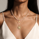 Layered look with the Beauty of Transformation Lotus Petal Necklace alongside other spiritual jewelry, perfect for meditation and expressing meaningful charm, connection to zodiac energies and manifestation.