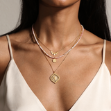 Layered look with the Beauty of Transformation Lotus Petal Necklace alongside other spiritual jewelry, perfect for meditation and expressing meaningful charm, connection to zodiac energies and manifestation.