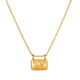 Dawn of Renewal Lotus Necklace featuring an intricate lotus flower engraved on a delicate rectangular pendant, symbolizing new beginnings. This spiritual jewelry piece is perfect for meditation, serving as a talisman for manifestation and meaningful protection during yoga practice.
