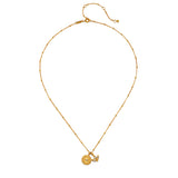 Flat lay of the Manifesting Possibilities Lotus White Topaz Necklace, emphasizing its intricate design and gold plating. This necklace serves as a meaningful charm that harmonizes with yoga and spiritual practices, embodying the themes of new beginnings and manifestation.