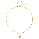 The Guiding Faith Star of David Necklace displayed on a white background, highlighting its intricate design and 18kt gold plating. This spiritual jewelry serves as a powerful talisman for meditation, protection, and meaningful connections in your yoga journey.
