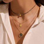 Layering the Shine in Sisterhood Constellation Necklace with other delicate necklaces, showcasing a stylish and spiritual jewelry ensemble. This unique piece harmonizes with your spiritual lifestyle, symbolizing protection and connection in the realm of meditation and zodiac energy.